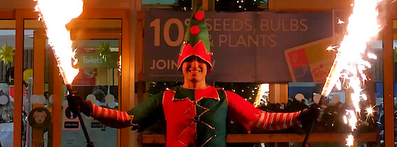 christmas elf fire performer